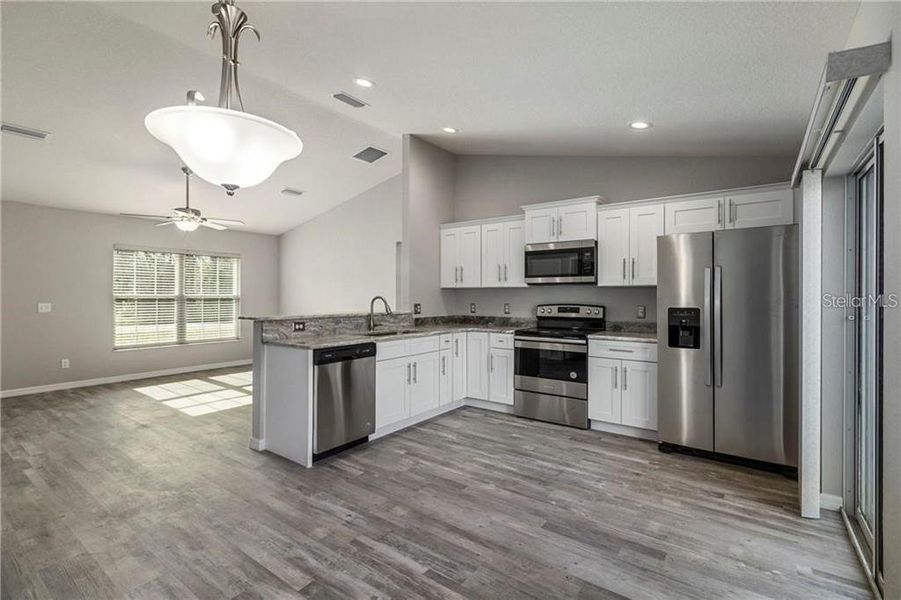 Furnished interior view inside a new home in , Dunnellon (Image 5).