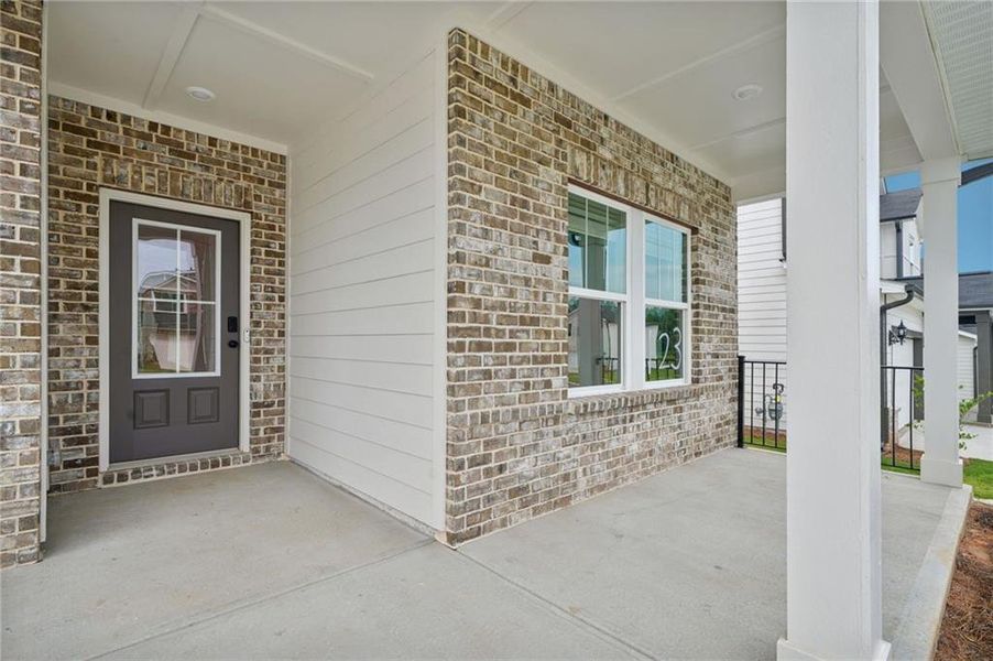 Exterior details and patio area of a home in Vines at Mill Creek - Estate Series, Braselton (Image 2).