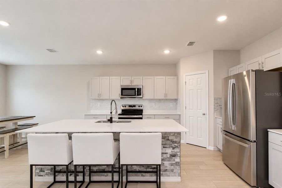 Furnished interior view inside a new home in Pasadena Point, Wesley Chapel (Image 10).