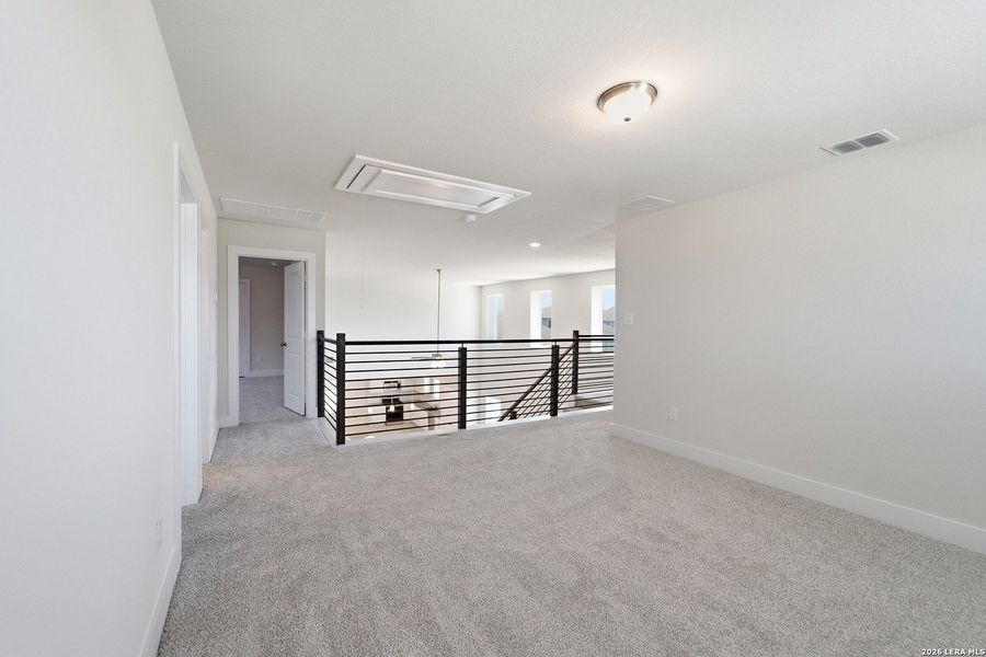 Spacious, unfurnished interior of a new home in Red Hawk Landing, San Antonio (Image 20).