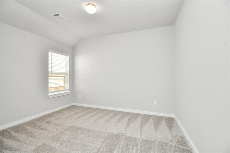 Another view at the secondary bedroom! Sample photo of completed home with similar floor plan. Actual colors and selections may vary.