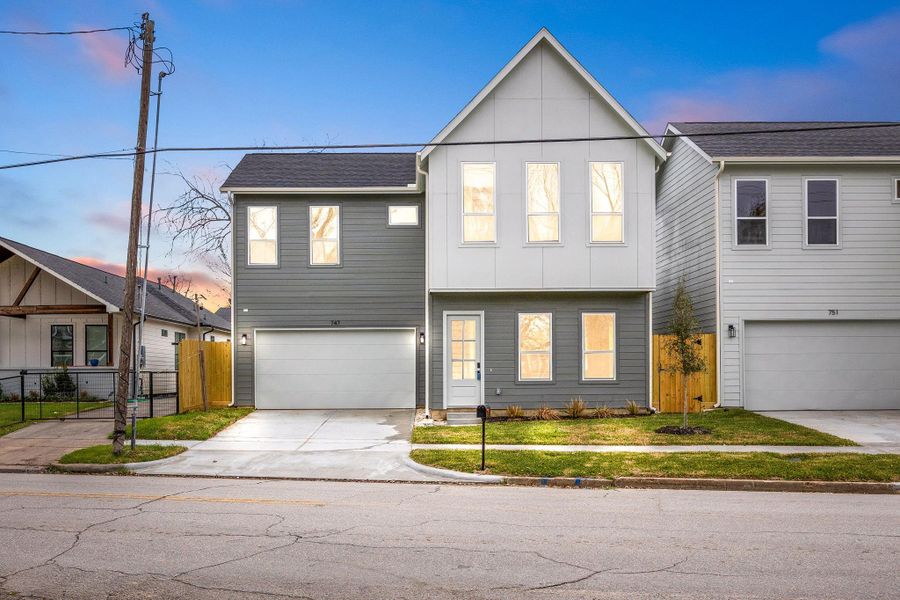 Welcome to 747 Dumble Street, a modern masterpiece nestled on a quiet street in Houston’s dynamic EaDo District—just minutes from Downtown! This stunning home boasts exceptional curb appeal, a sleek contemporary design, and a private double-wide driveway. The inviting entryway, featuring an elegant glass-detailed front door, sets the tone for the stylish interiors within. Enjoy a beautifully designed, low-maintenance lawn, perfect for effortless living. Welcome to 747 Dumble Street, a modern masterpiece nestled on a quiet street in Houston’s dynamic EaDo District—just minutes from Downtown! This stunning home boasts exceptional curb appeal, a sleek contemporary design, and a private double-wide driveway. The inviting entryway, featuring an elegant glass-detailed front door, sets the tone for the stylish interiors within. Enjoy a beautifully designed, low-maintenance lawn, perfect for effortless living.