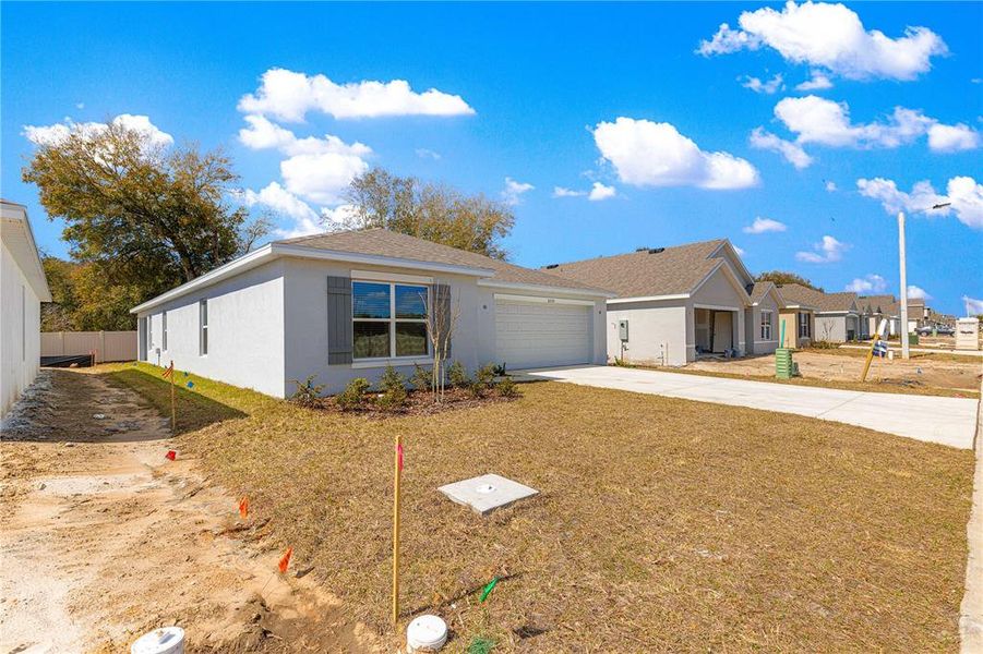 Exterior details and patio area of a home in , Wildwood (Image 3).