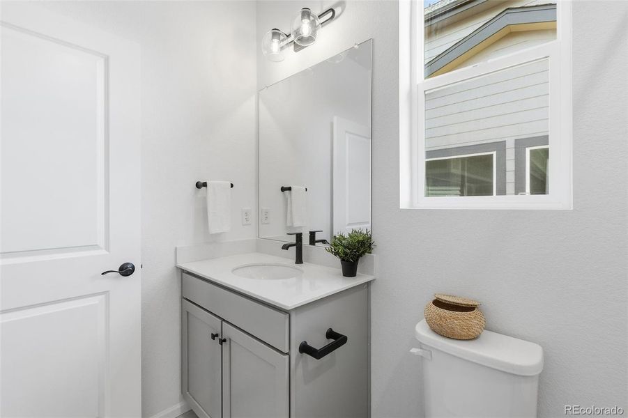 Furnished interior view inside a new home in The Cottages Collection at Ridgeline Vista, Brighton (Image 31).