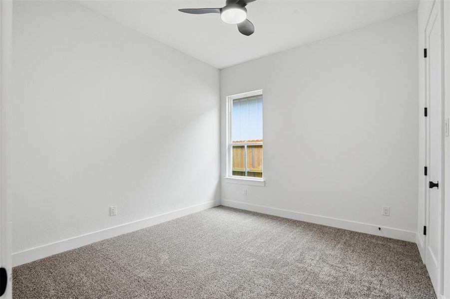 Neutral wall tones paired with textured carpeting