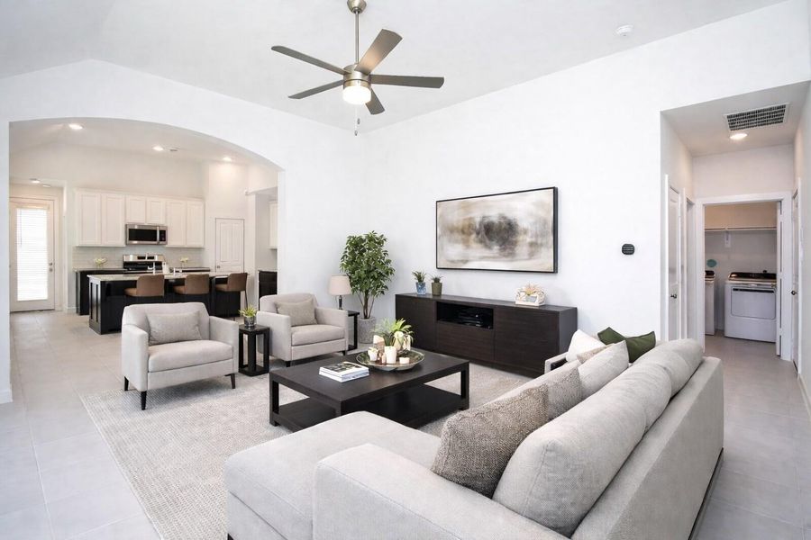 Furnished interior view inside a new home in Meridiana, Iowa Colony (Image 6).