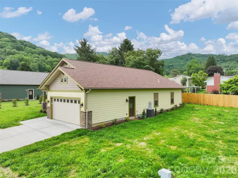 Exterior details and patio area of a home in , Waynesville (Image 3).