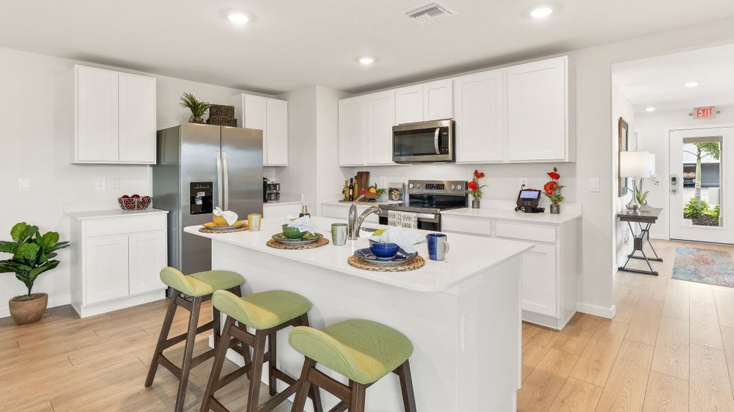 Furnished interior view inside a new home in Coral Bay - Express & Tradition, North Fort Myers (Image 8).