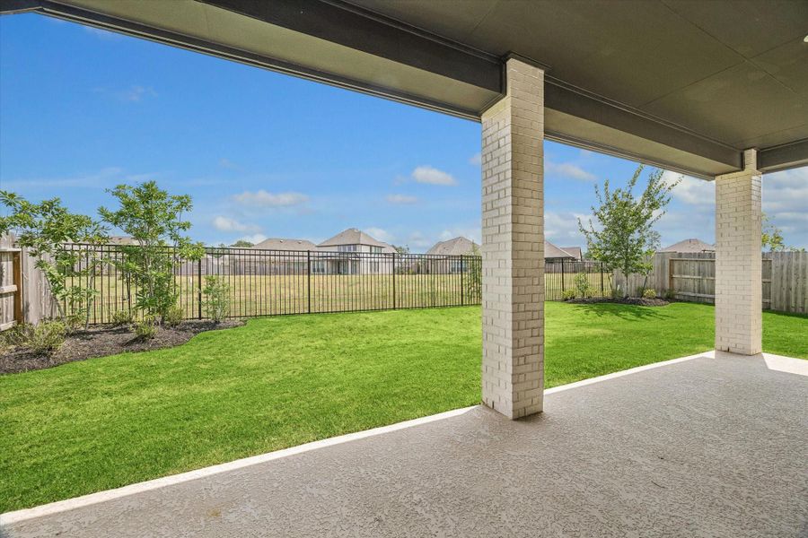 Exterior details and patio area of a home in Artavia, Conroe (Image 3).