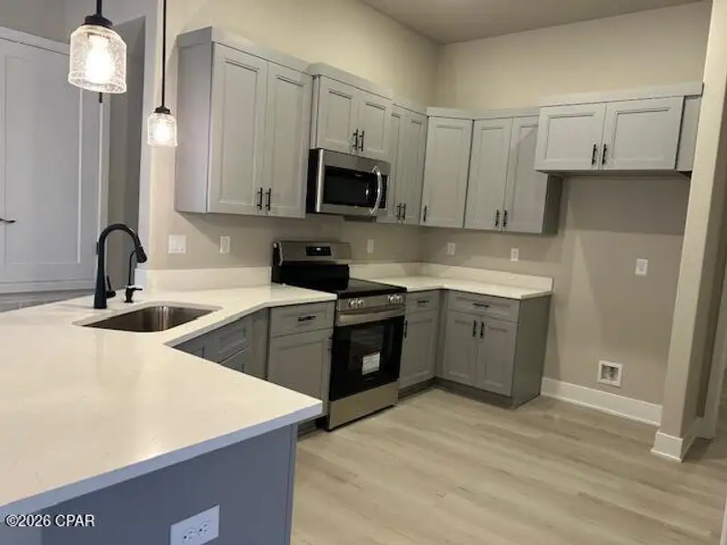 Furnished interior view inside a new home in College Station, Panama City (Image 3).