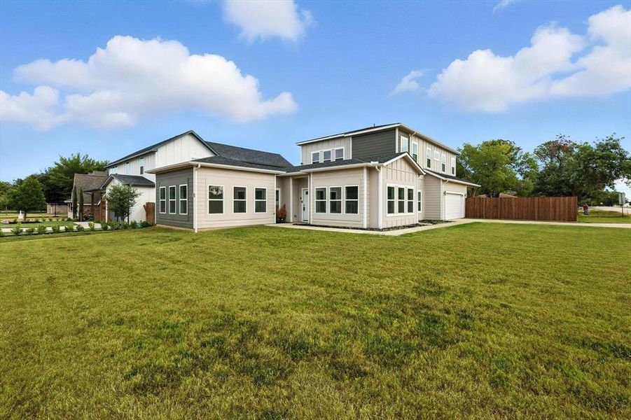 Front exterior of a new home in , Roanoke, TX, highlighting curb appeal (Image 1).