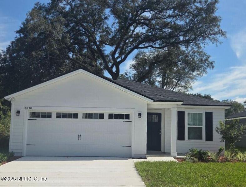 Front exterior of a new home in , Jacksonville, FL, highlighting curb appeal (Image 11).