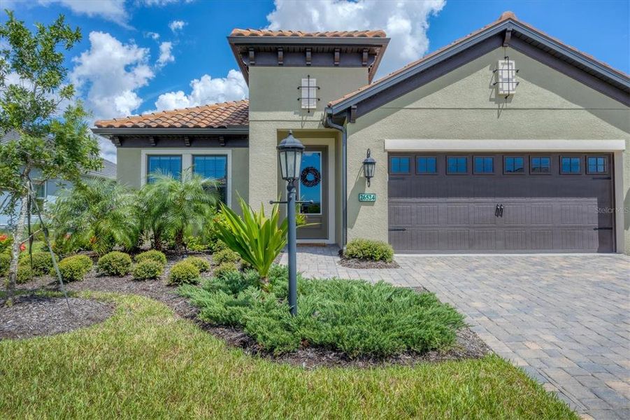 Front exterior of a new home in , Englewood, FL, highlighting curb appeal (Image 28).