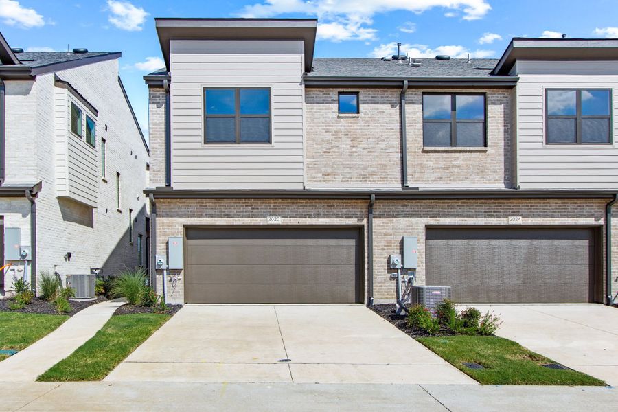 Front exterior of a new home in Ten Mile Creek, Celina, TX, highlighting curb appeal (Image 22).