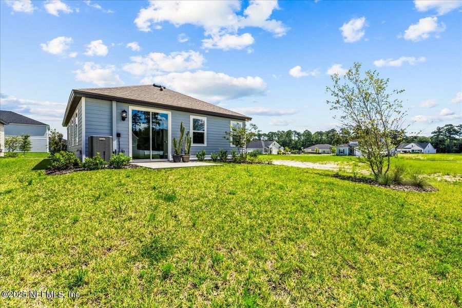 Exterior details and patio area of a home in Jennings Farm, Middleburg (Image 3). Exterior details and patio area of a home in Jennings Farm, Middleburg (Image 3).