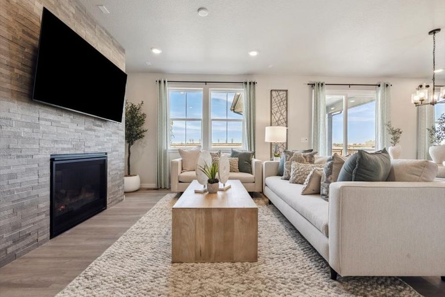 A living room with a fireplace.