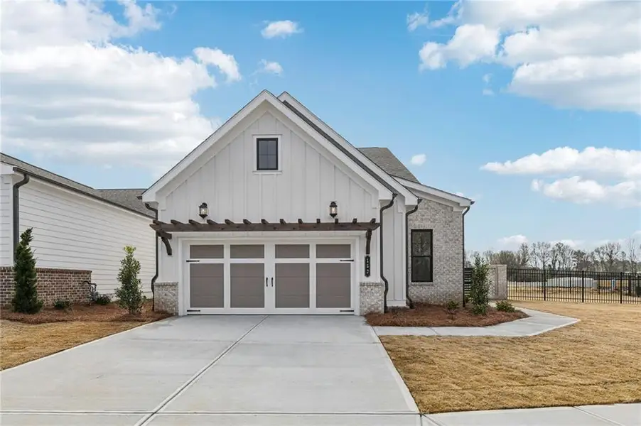 Front exterior of a new home in Aberdeen, Hoschton, GA, highlighting curb appeal (Image 18).