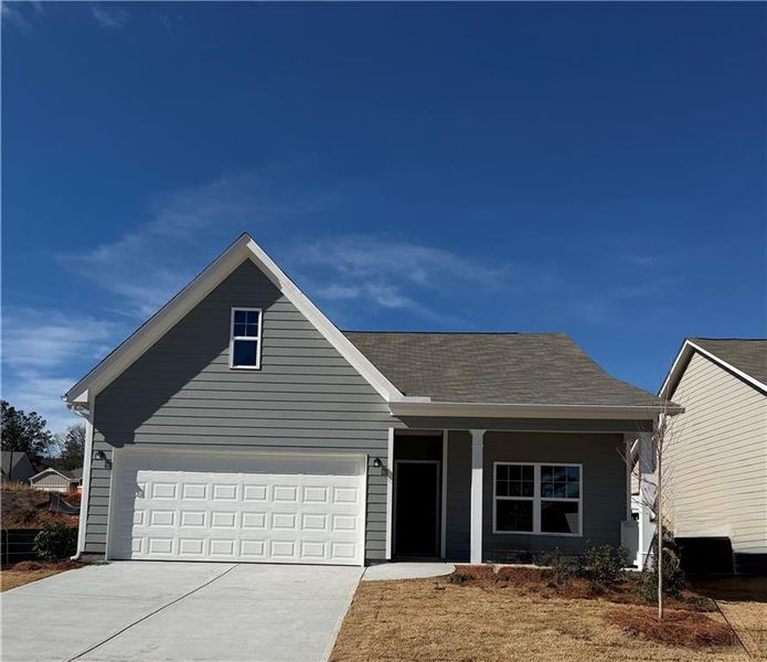 Front exterior of a new home in Villages at Cedar Hill, Dallas, GA, highlighting curb appeal (Image 1). Front exterior of a new home in Villages at Cedar Hill, Dallas, GA, highlighting curb appeal (Image 1).