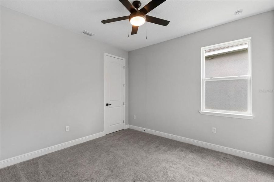 Spacious, unfurnished interior of a new home in Hills of Minneola, Minneola (Image 32).