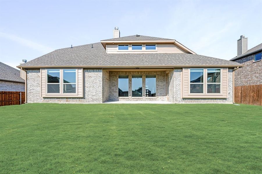 Front exterior of a new home in Ridgepoint, Midlothian, TX, highlighting curb appeal (Image 2).