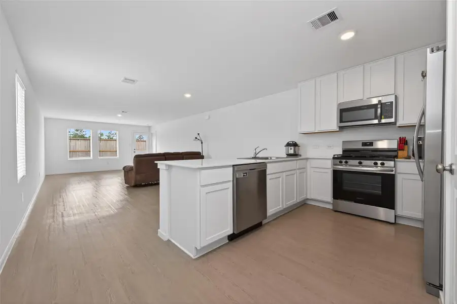 Furnished interior view inside a new home in Indian Springs, Crosby (Image 4).