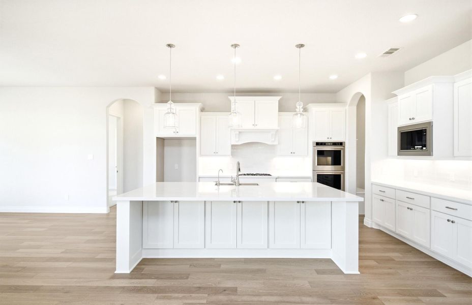 Furnished interior view inside a new home in Bridgeland 60′, Cypress (Image 12).