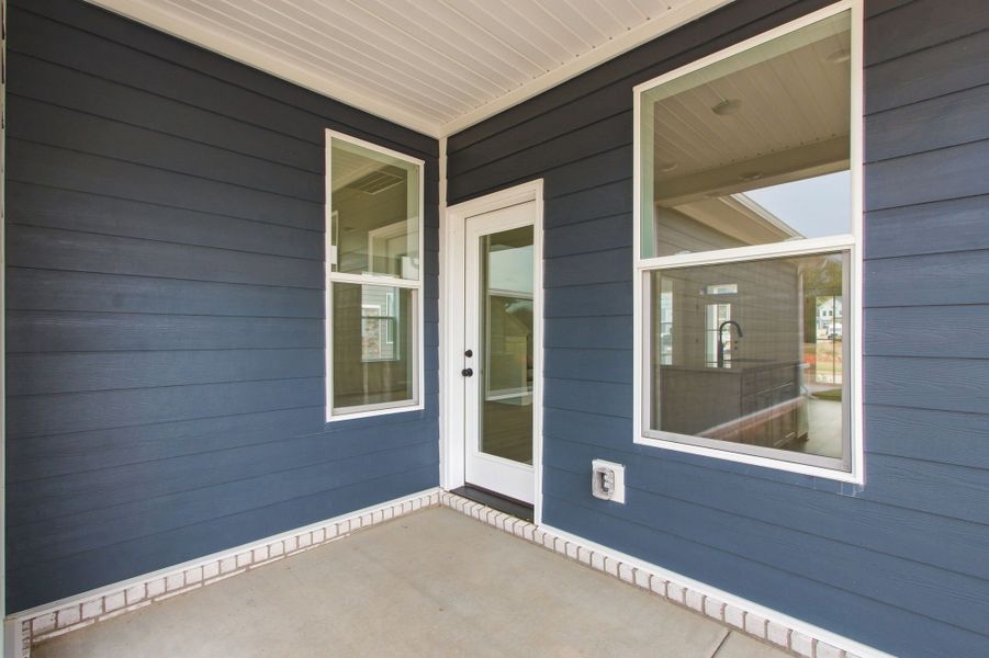 Exterior details and patio area of a home in Heritage Green – The Porch Collection, Columbia (Image 3).
