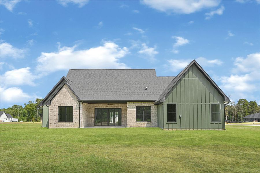 Exterior details and patio area of a home in , Conroe (Image 3).