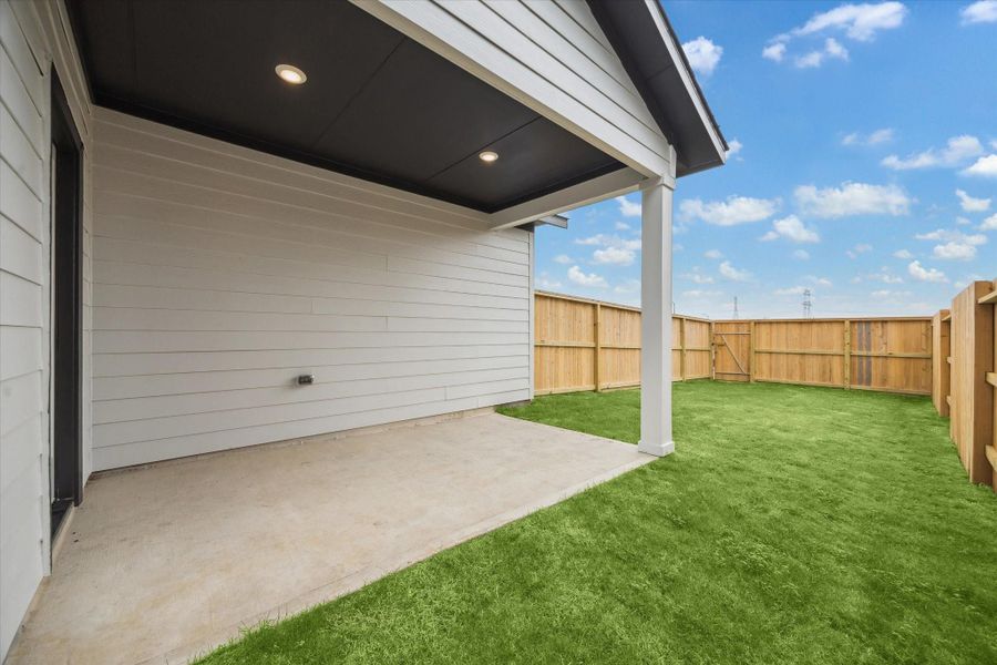 Exterior details and patio area of a home in Elyson, Katy (Image 4).