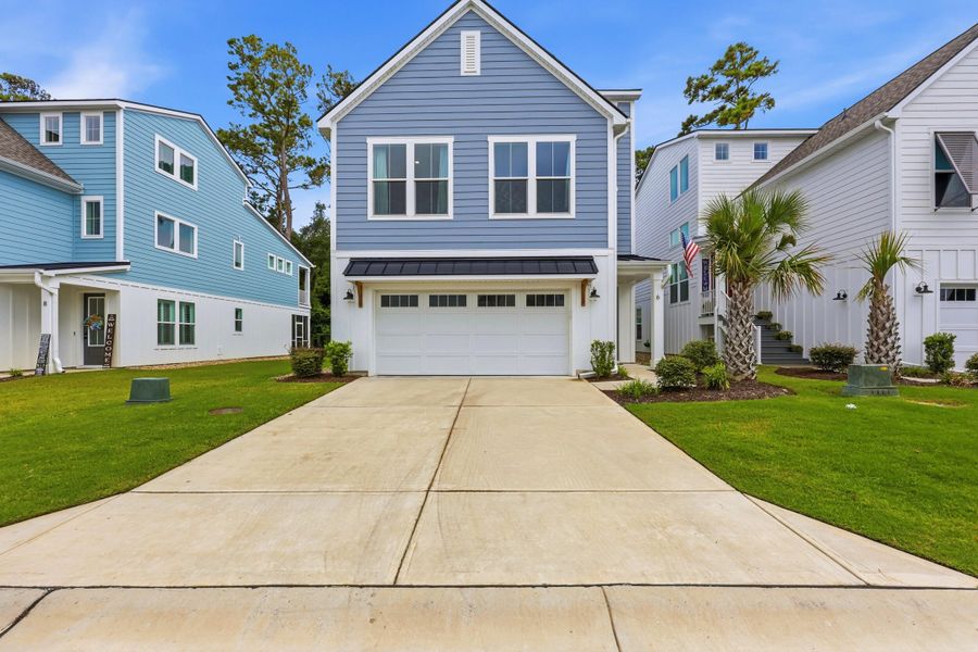 Front exterior of a new home in , North Myrtle Beach, SC, highlighting curb appeal (Image 27). Front exterior of a new home in , North Myrtle Beach, SC, highlighting curb appeal (Image 27).