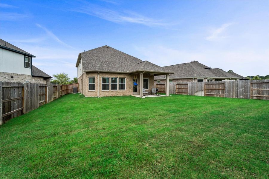 Exterior details and patio area of a home in Sorella, Tomball (Image 27).