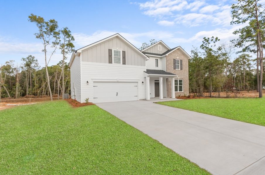 Front exterior of a new home in Ramsey Landing, Rincon, GA, highlighting curb appeal (Image 2). Front exterior of a new home in Ramsey Landing, Rincon, GA, highlighting curb appeal (Image 2).