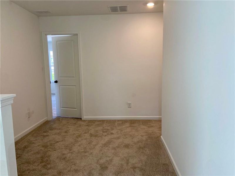 Spacious, unfurnished interior of a new home in Eastlyn Crossing, Flowery Branch (Image 25).