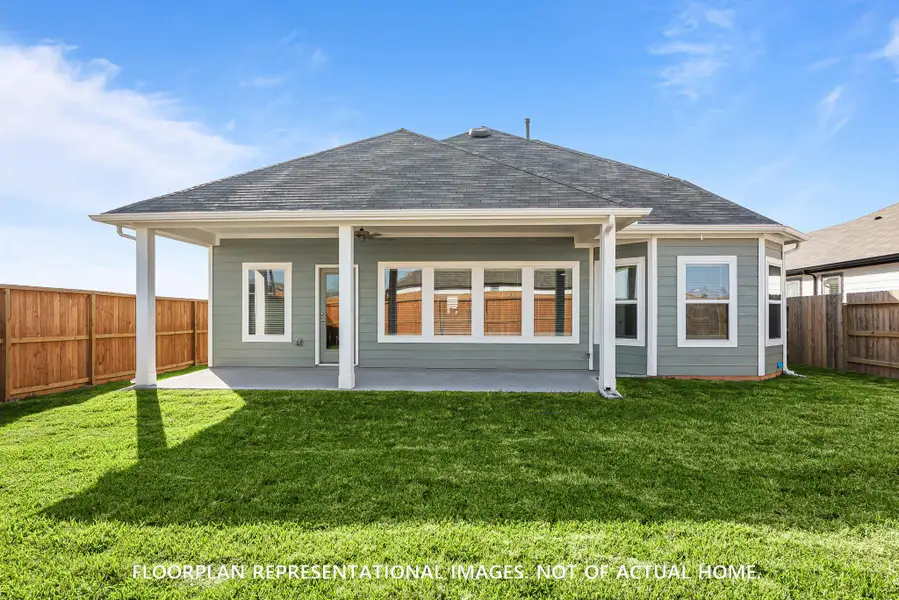 Front exterior of a new home in Sorella, Tomball, TX, highlighting curb appeal (Image 2).