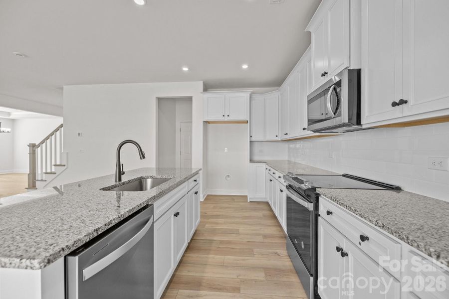 Kitchen Photos are representative and may not reflect the exact home, finishes, or features.