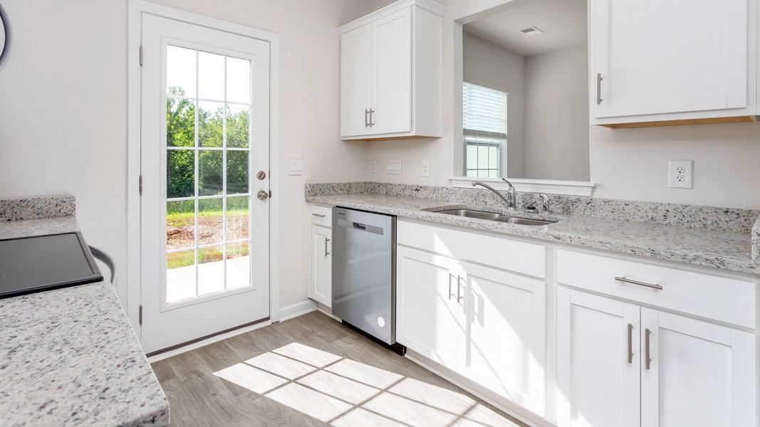 Representative furnished interior of a home built from the NEWTON by D.R. Horton in Henley Ridge, Graham (Image 6).