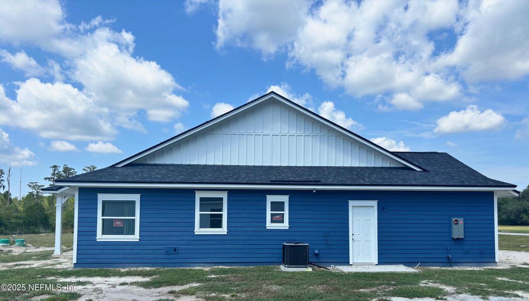 Front exterior of a new home in , Melrose, FL, highlighting curb appeal (Image 14).