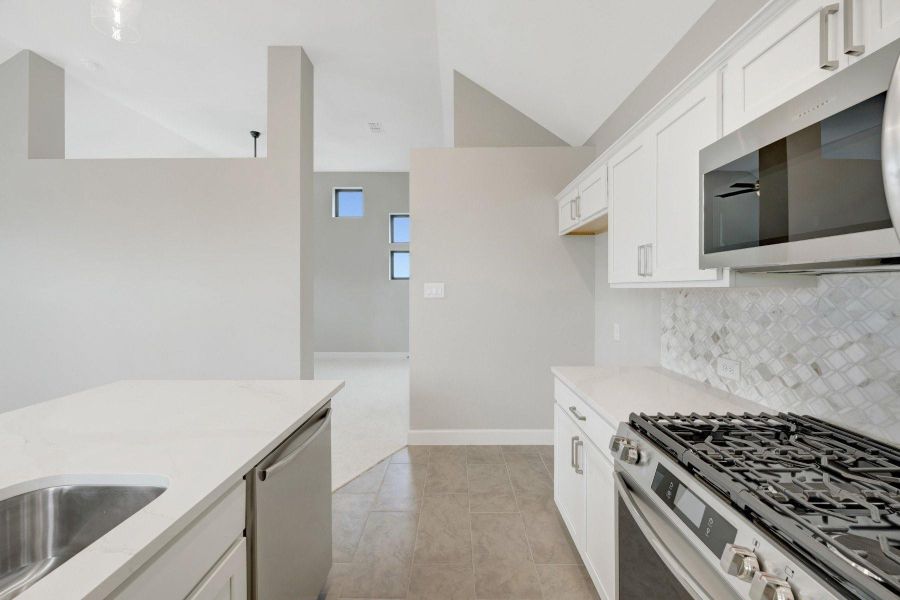 Furnished interior view inside a new home in Riceland - Enclave Row Collection, Mont Belvieu (Image 4).
