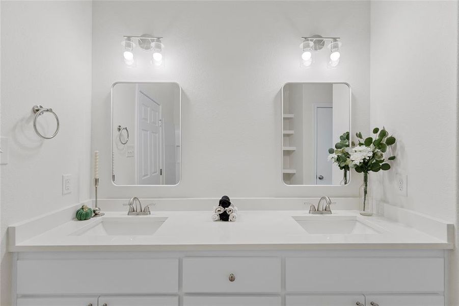 Full bathroom with double vanity Full bathroom with double vanity