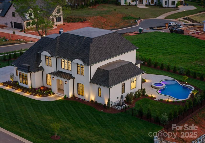 Front exterior of a new home in , Weddington, NC, highlighting curb appeal (Image 19).