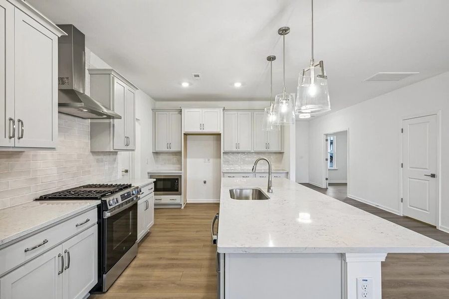 Kitchen featuring the AW Collection® Milan - Chic gray finishes and smooth surfaces shine. Kitchen featuring the AW Collection® Milan - Chic gray finishes and smooth surfaces shine.