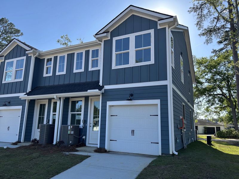 Rear Exterior with 1-Car Garage