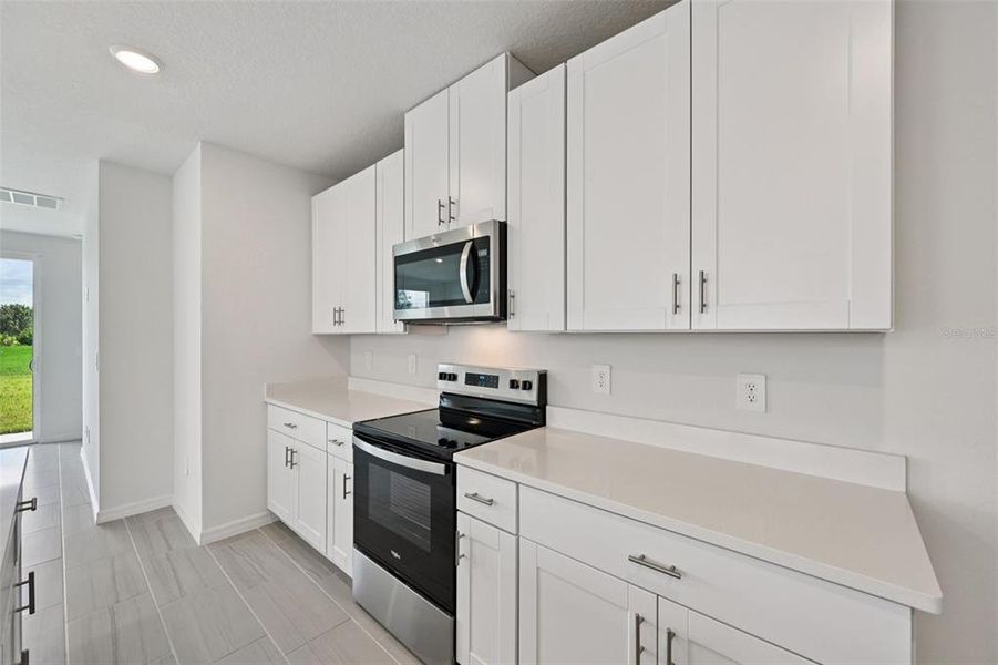 Furnished interior view inside a new home in Salt Meadows - Premier Series, Parrish (Image 4).