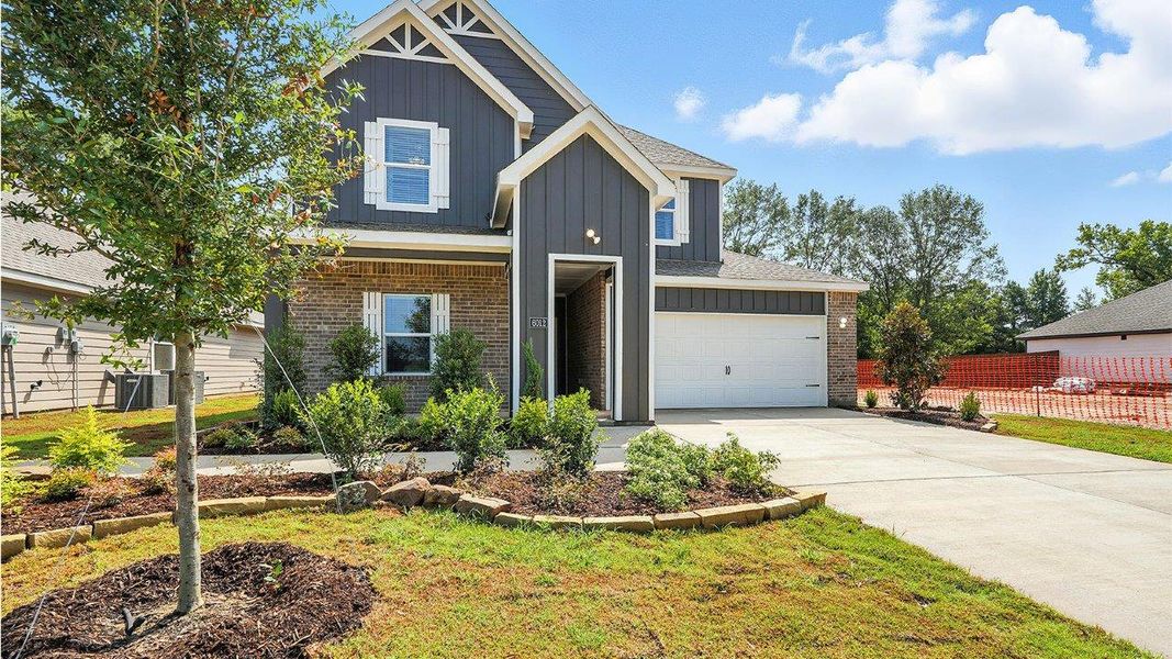 Representative exterior photo of a completed home built from the Naples by D.R. Horton in The Reserve at Timber Creek, Lindale, TX (Image 19).
