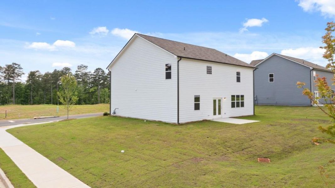 Exterior details and patio area of a home in Fairway 17 at Mirror Lake, Villa Rica (Image 3).