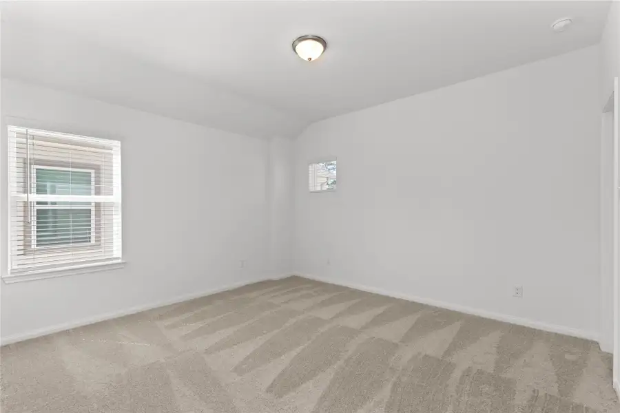 Spacious, unfurnished interior of a new home in Harmony Cove, Humble (Image 24).