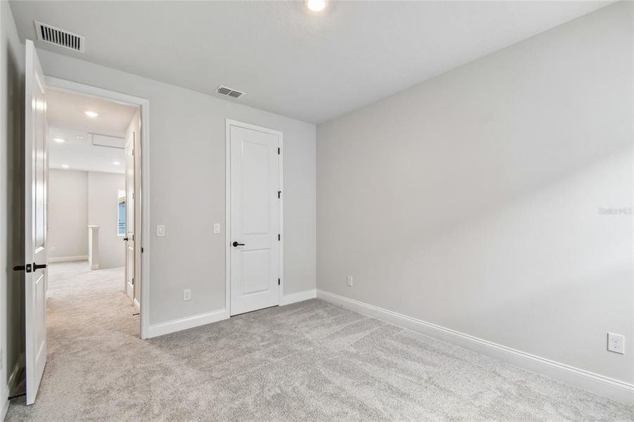 Spacious, unfurnished interior of a new home in Oakfield at Mount Dora Village Series, Mount Dora (Image 32).
