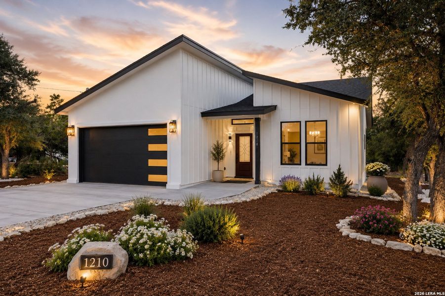 Front exterior of a new home in , Fischer, TX, highlighting curb appeal (Image 25).