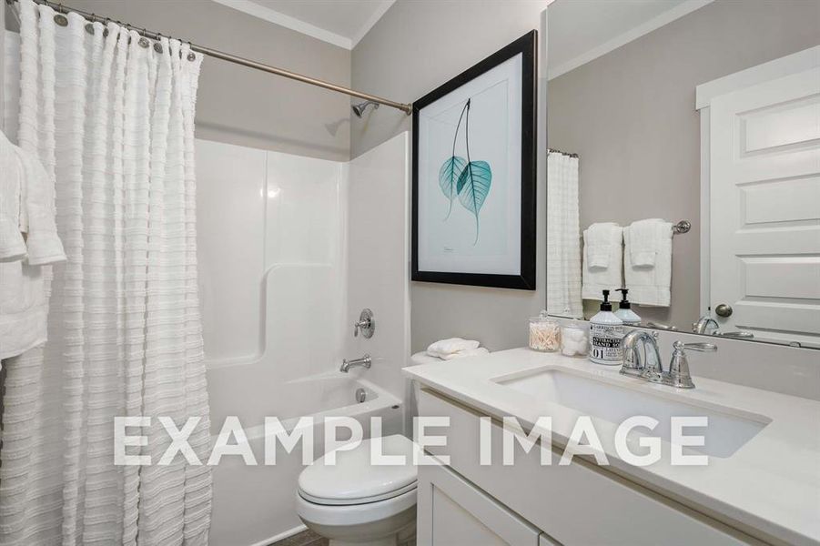 Full bathroom with shower / bath combination with curtain, vanity, toilet, and crown molding