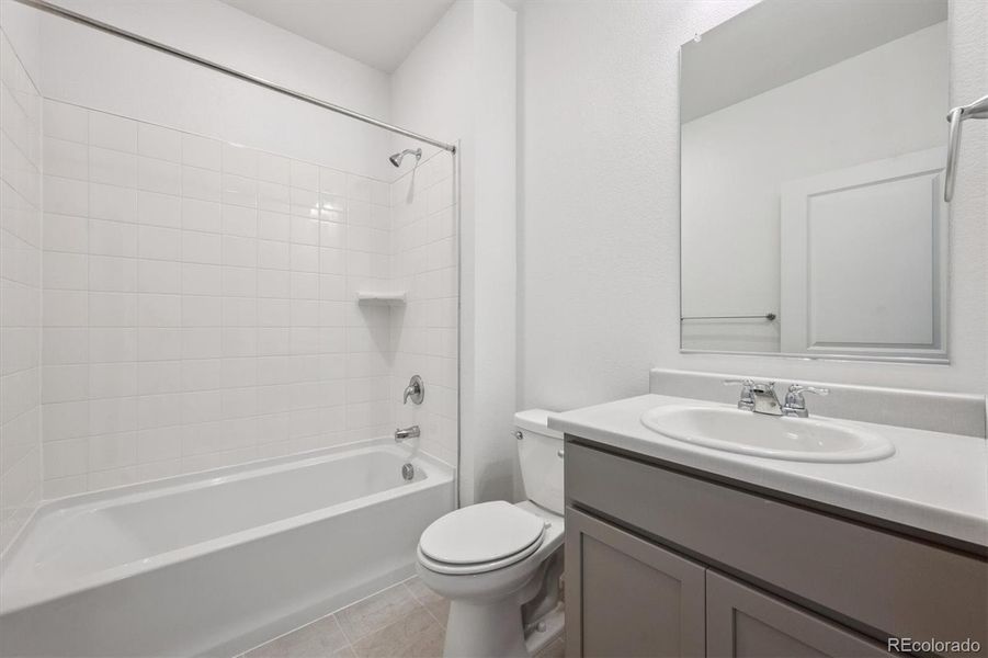 Furnished interior view inside a new home in Silver Peaks, Lochbuie (Image 7).